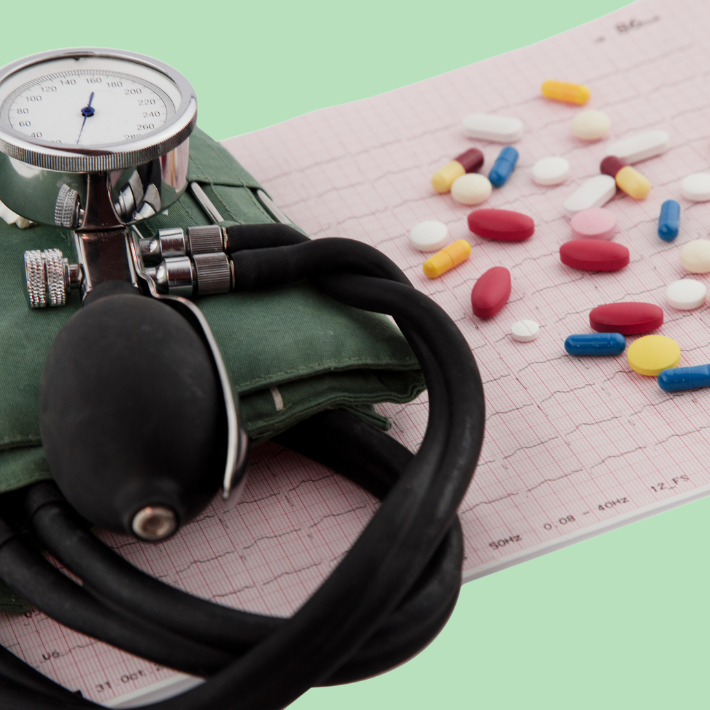 Blood pressure monitor and pills.